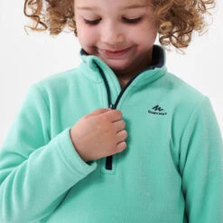 Quechua Wandelfleece MH100 Turquoise Kinderen 2-6 Jaar 11 Quechua Wandelfleece MH100 Turquoise Kinderen 2-6 Jaar -Quechua wandelfleece mh100 turquoise kinderen 2 6 jaar 4